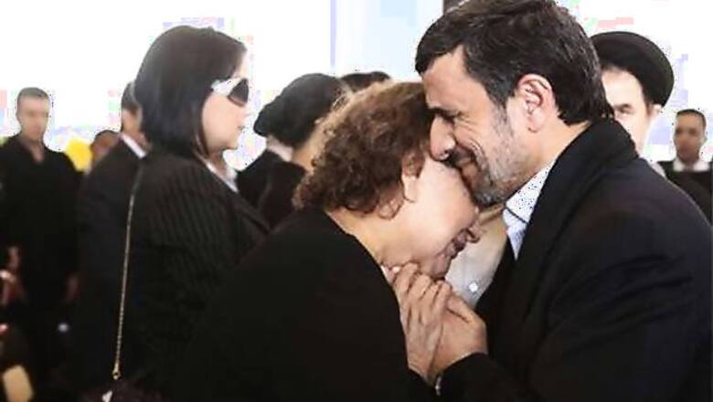 Ahmadinejad under fire for hugging Chavez's mother