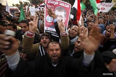 Egyptians vote on divisive constitution