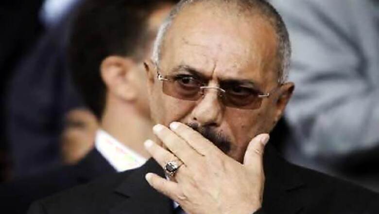 Yemen's Saleh leaves for US, opponents protest