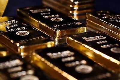 Gold eases off record as dollar regains momentum