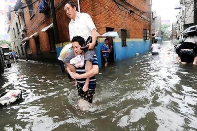 China: Floods wreak havoc, over 7000 evacuated as dike on Heilong river bursts