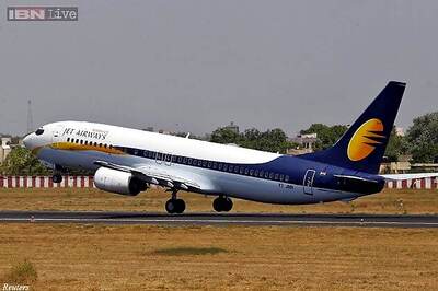 Jet to stop low-cost services, to merge them with parent carrier