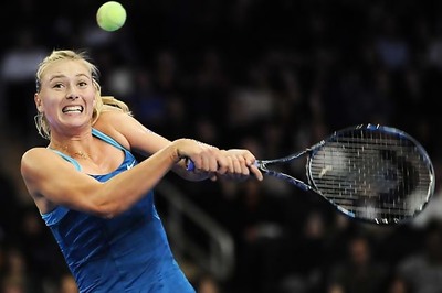 Sharapova beats Wozniacki in exhibition match