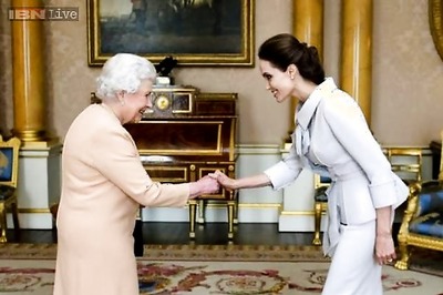 Britain's Queen Elizabeth makes actress Angelina Jolie a Dame
